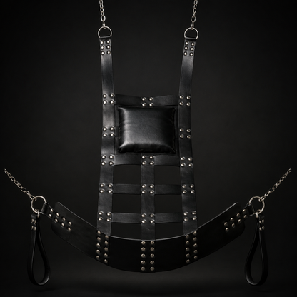 Black chrome leather sex swing with padded headrest, lattice-grid seat panel, and riveted hardware