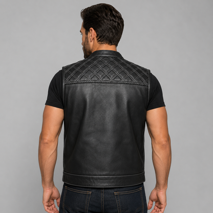 Back view of a cowhide leather biker vest showing quilted shoulder stitching detail.