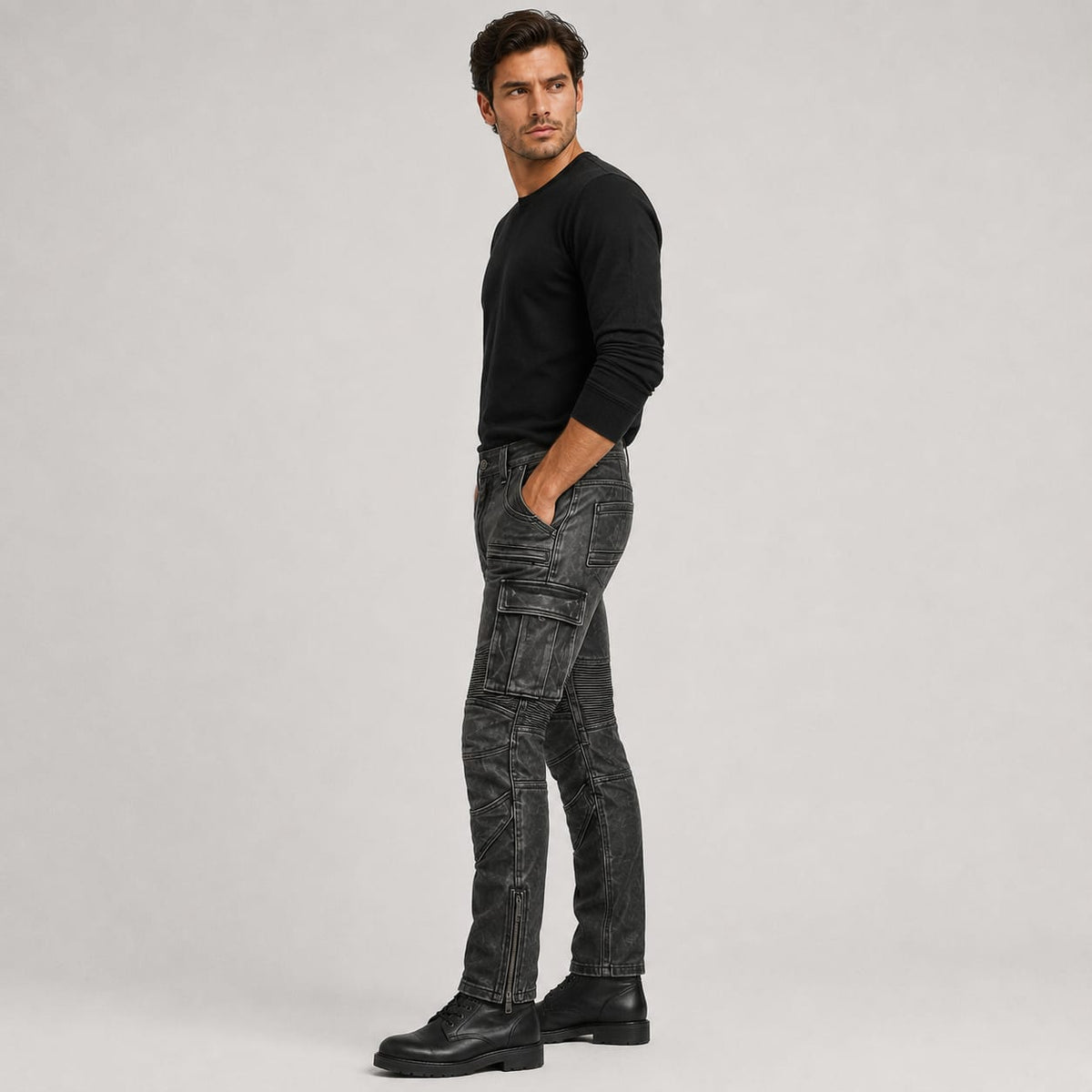 Side view of grey leather motorcycle cargo pants highlighting cargo pocket and side zipper detail"