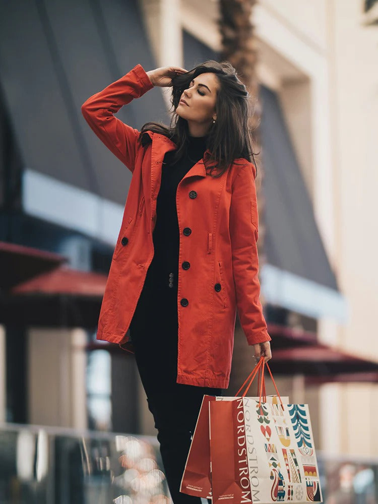 Women fashion apparel – ShopBasix stylish red coat with shopping bags