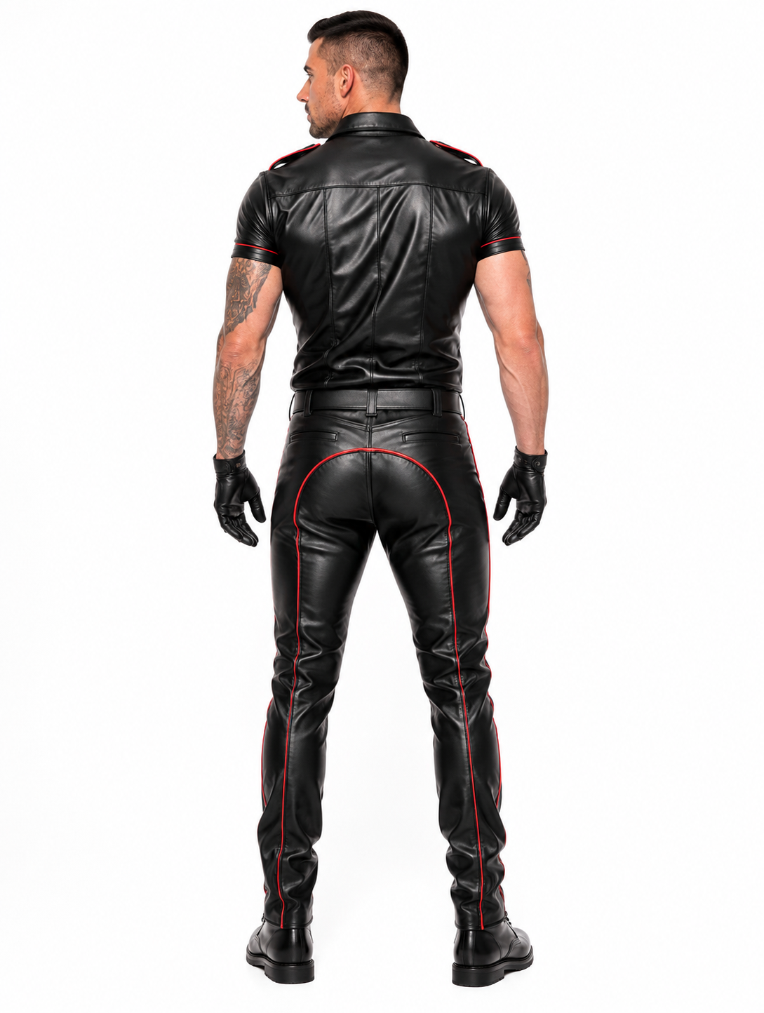 Man wearing black leather uniform outfit with blue piping in moody leather bar setting
