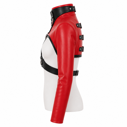 Side view of red cropped vegan-leather harness jacket showing posture collar and silhouette profile on white background